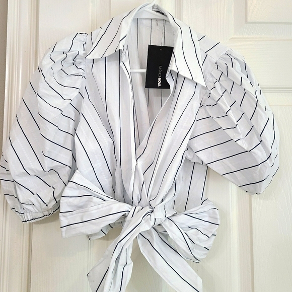 Fashion Nova Tops - Crop top with bow. Never been worn brand new